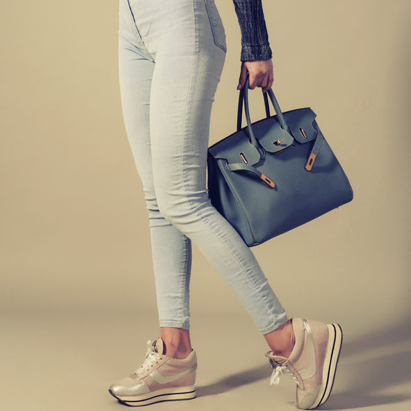 Holding Hermes Birkin